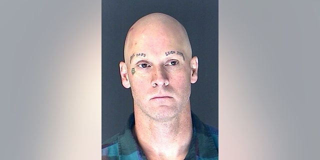 This Friday, April 5, 2013 photo provided by the El Paso County Sheriff's Office shows 47-year-old James Lohr. Lohr, a white supremacist prison gang member, was arrested and another was still being sought for questioning Friday in the death of Colorado's prisons chief as authorities investigated whether the gang had any ties to the killing. (AP Photo/El Paso County Sheriff's Office)