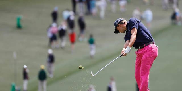 FILE - In this April 7, 2016, file photo, Smylie Kaufman hits on the first fairway during the first round of the Masters golf tournament in Augusta, Ga. Fresh off his impressive showing at the Masters, PGA Tour rookie and former LSU golfer Kaufman is preparing for another heaping of fanfare at the Zurich Classic. “This is definitely a home game for me,” Kaufman said. In terms of fan support, that is. As far as knowing the ins and outs of the Pete Dye-designed TPC Louisiana course, not so much. (AP Photo/Matt Slocum, File)