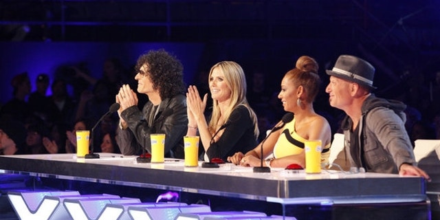 "America's Got Talent" judges (left to right) Howard Stern, Heidi Klum, Mel B and Howie Mandel are shown.