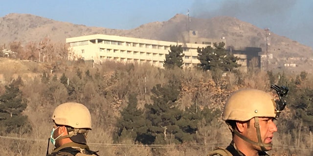 Smokes rises from the Intercontinental Hotel after an attack in Kabul, Afghanistan, Sunday, Jan. 21, 2018.