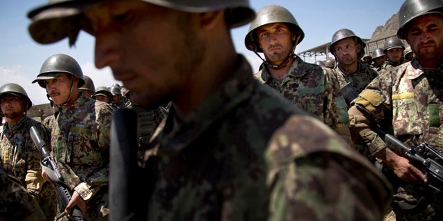 May 8, 2013: In this file photo, Afghan Army soldiers gather at a training facility in the outskirts of Kabul, Afghanistan.