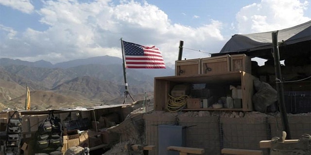 A U.S. flag is seen at a post in Deh Bala district, Nangarhar province, Afghanistan after the area was recaptured from ISIS fighters.