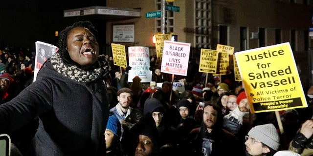 Protesters were undeterred Thursday night by the release of video confirming that the slain suspect was behaving in a threatening manner.