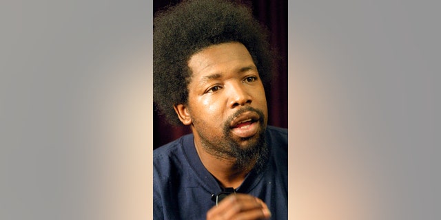 FILE - In this Aug. 22, 2001 file photo, Afroman, whose real name is Joseph Foreman, poses for a portrait in New York. Musician and rapper Afroman has agreed to pay $65,000 to settle a lawsuit filed by a woman he punched during a 2015 Mississippi performance. A judgment filed Thursday, May 24, 2018 in Harrison County Circuit Court says Afroman must pay Haley Byrd in monthly installments of $10,000 and if he does not, he will owe her $125,000. (AP Photo/Shawn Baldwin, File)
