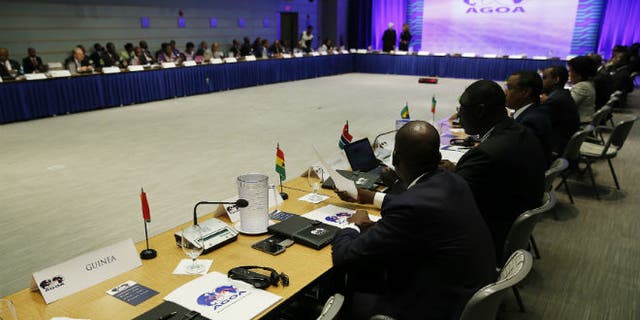 The seat of the representative from Guinea remains empty during the opening session at the AGOA Forum at the U.S.-Africa Leaders Summit in Washington August 4, 2014. The leaders of Guinea and Sierra Leone have skipped the summit to deal with the Ebola crisis in their countries. REUTERS/Gary Cameron