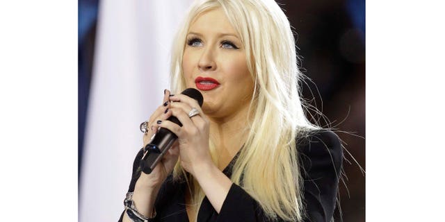 Christina Aguilera has been invited to sing a do-over after her Super Bowl Star Spangled Banner fiasco.