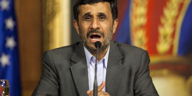 Iran President Mahmoud Ahmadinejad talks to the media in Caracas, Venezuela, Nov. 25. (Reuters Photo)