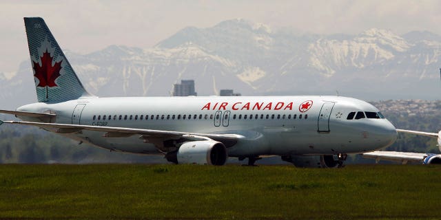 An Air Canada flight almost landed on a crowded taxiway filled with passenger planes.