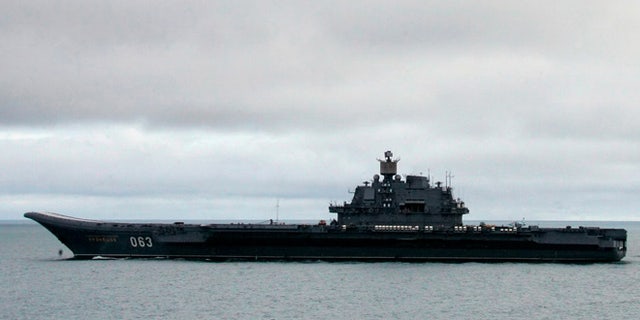 FILE: The Russian aircraft carrier Admiral Kuznetsov, seen here in the Barents Sea, is Moscow’s largest and is being sent to the Mediterranean after military buildup by the US.