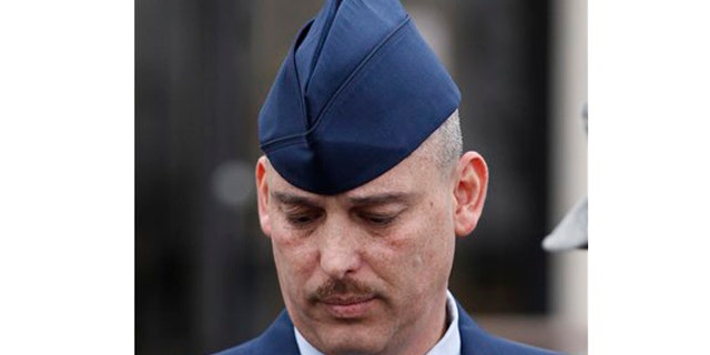 Jan. 19, 2011: Air Force Sgt. David Gutierrez walks out of the Law Center at McConnell Air Force Base in Wichita, Kan., for a lunch recess. The defense rested Wednesday for Gutierrez, who is HIV positive and is accused of exposing multiple sex partners to HIV at swinger parties.