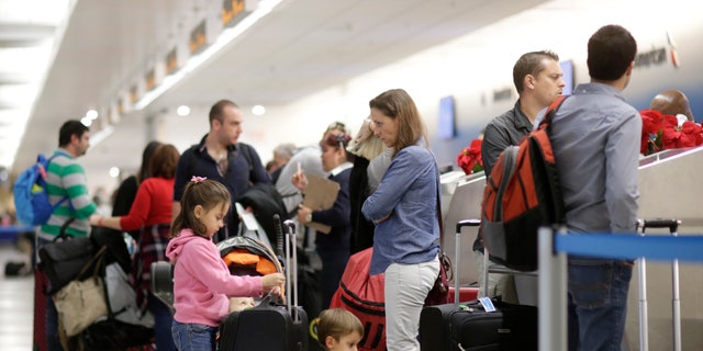 Travelers in Miami International Airport