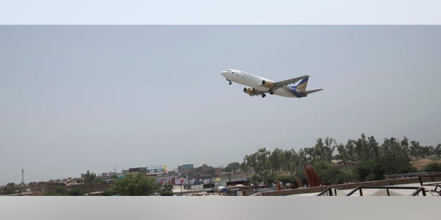 FILE: June 2014: A commercial airplane leaves Bacha Khan airport in Peshaswar, Pakistan.