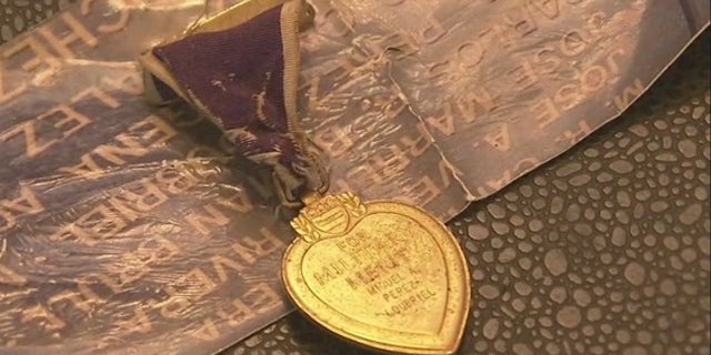 The Purple Heart spotted at the baggage claim.