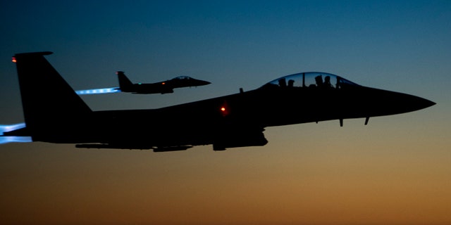 Sept. 23, 2014: In this photo released by the U.S. Air Force, a pair of U.S. F-15E Strike Eagle flies over northern Iraq.. (AP)