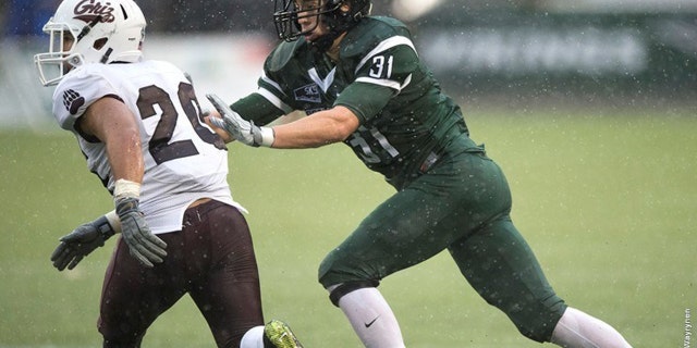 Oct. 31, 2015: This photo shows Portland State University linebacker AJ Schlatter in action against the Montana Grizzlies. The school announced that Schlatter died at his home in Camy, Ore. Sunday, Jan. 17, 2016. (Portland State University)