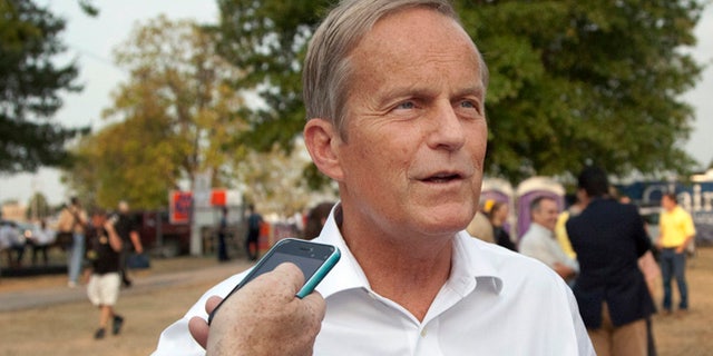 Aug. 16, 2012: Rep. Todd Akin, R-Mo., talks with reporters while attending the Governor's Ham Breakfast at the Missouri State Fair in Sedalia, Mo.