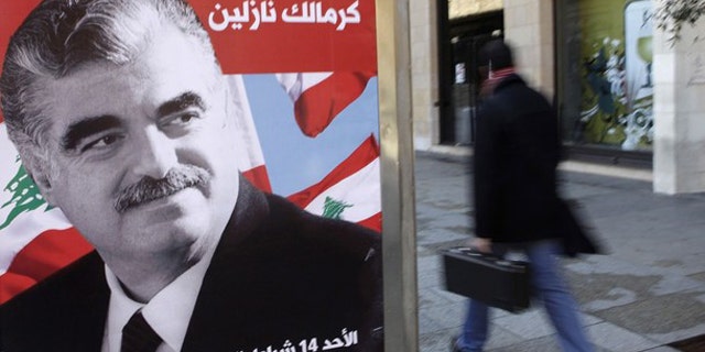 Former Lebanese Prime Minister Rafik Hariri, pictured above, was killed along with 22 other people by a huge truck bomb blast on Feb. 14, 2005, on Beirut's Mediterranean sea front (Reuters).