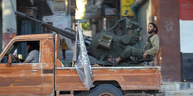 Members of Al-Qaeda’s Jabhat al-Nusra in Idlib Province, Syria