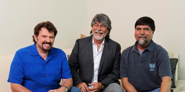In this Tuesday, Aug. 13, 2013 photo, Jeff Cook, Randy Owen and Teddy Gentry from the American country music band Alabama pose for a portrait in Nashville, Tenn. Alabama has launched a tour and released a new album this week, “Alabama &amp; Friends,” that features duets of the group’s biggest hits with top country stars.