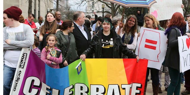 Feb. 9, 2015: Supporters of same-sex marriage hold signs outside the Jefferson County Courthouse in Birmingham, Alabama.