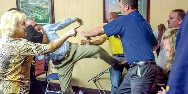 AL mayor fight