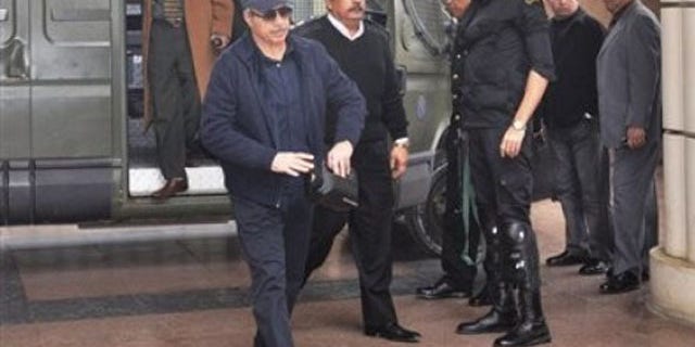 Jan. 5, 2012: Former Egyptian Interior Minister Habib al-Adly arrives at a court house in Cairo, Egypt.