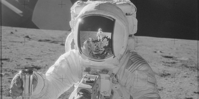 Apollo 12 astronaut Alan Bean, photographed by Cmdr. Pete Conrad (reflected in visor) in November of 1969.