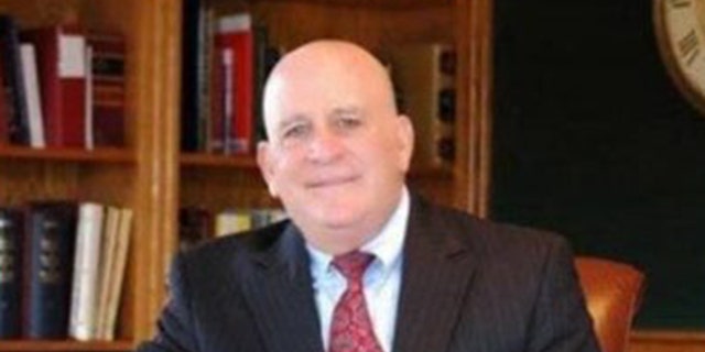 Alan J. Abrahamson staged his suicide to look like a murder, police said.