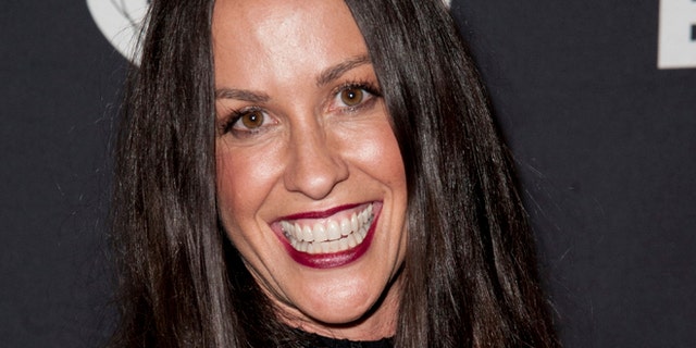 FILE - This June 20, 2014 file photo Alanis Morissette arrives at the 4th Annual Production Of The 24 Hour Plays After-Party in Santa Monica, Calif.