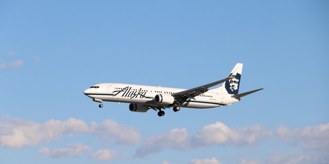 alaska airlines carry on size change