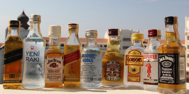 You can take as many of these as you can fit in a zip-top bag, but you may not be allowed to drink them on the flight.