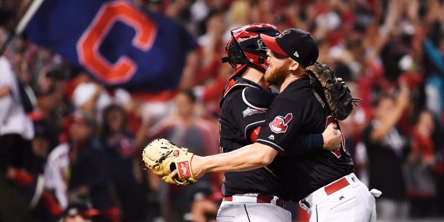 Oct. 15, 2016: Cleveland Indians relief pitcher Cody Allen, right, and catcher Roberto Perez celebrate their 2-1 win against the Toronto Blue Jays in Game 2 of baseball's American League Championship Series in Cleveland.