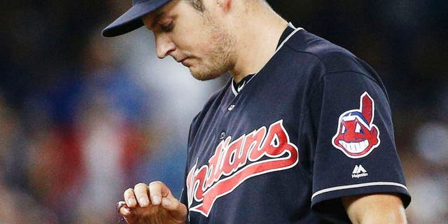 TORONTO, ON - OCTOBER 17 - Trevor Bauer #47 of the Cleveland Indians looking at his bloodied finger during the first inning in Game 3 of the ALCS baseball series against the Toronto Blue Jays at the Rogers Centre in Toronto, October 17, 2016 (Carlos Osorio/Toronto Star via Getty Images) (Carlos Osorio/Toronto Star via Getty Images)
