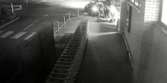 After they towed it out. the crooks loaded the ATM into a VW Golf and drove away.