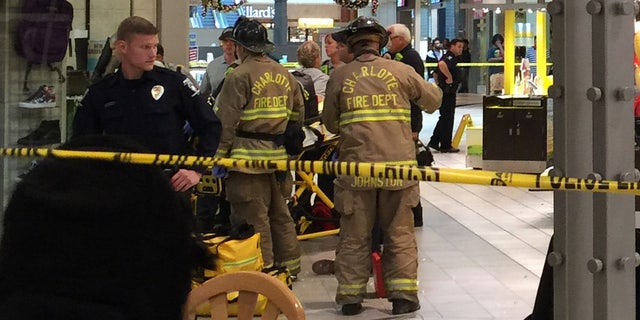 Emergency responders staged inside the Northlake Mall.
