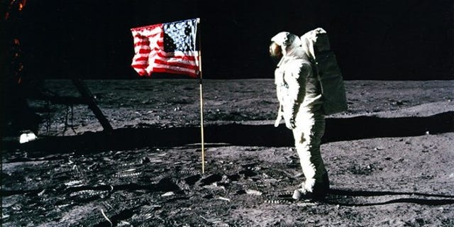 Buzz Aldrin salutes the U.S. flag on the surface of the moon.