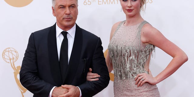 Actor Alec Baldwin, from the NBC sitcom "30 Rock," arrives with his daughter Ireland at the 65th Primetime Emmy Awards in Los Angeles September 22, 2013. REUTERS/Mario Anzuoni (UNITED STATES - Tags: ENTERTAINMENT) (EMMYS-ARRIVALS) - RTX13VQY