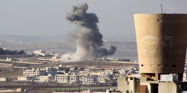 Feb. 3, 2016: Smoke rises after airstrikes by pro-Syrian government forces in Anadan city, about 10 kilometers away from the towns of Nubul and Zahraa, Northern Aleppo countryside, Syria.
