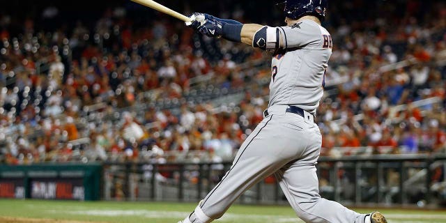 Houston Astros Alex Bregman (2) hits a solo home run in the 10th inning during the Major League Baseball All-Star Game, Tuesday, July 17, 2018 in Washington.