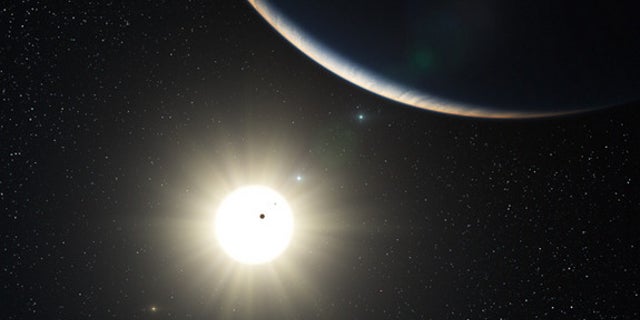 This artist's impression shows the remarkable planetary system around the sun-like star HD 10180.