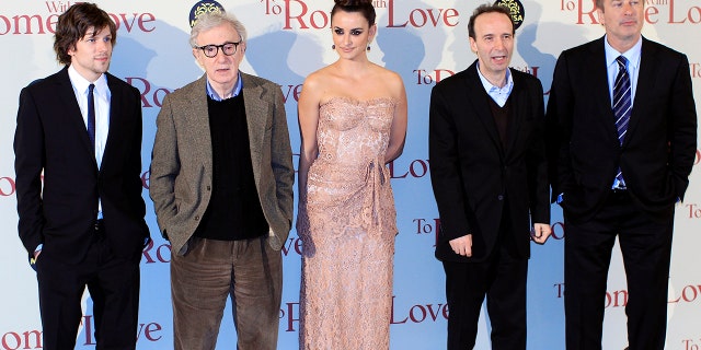 Director Woody Allen (2nd L) and cast members, Jesse Eisenberg (L), Penelope Cruz (C), Roberto Benigni (2nd R) and Alec Baldwin, pose during the premiere of the film "To Rome with Love" in Rome April 13, 2012.