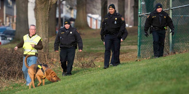 In this Friday, Jan. 1, 2016, photo, Allentown, Pa., police use a search and rescue dog in Keck Park as the search continues for Jayliel Vega Batista, a missing 5-year-old autistic boy who wandered off from a New Year's Eve party on Thursday night. (Chris Shipley/The Morning Call via AP) THE EXPRESS-TIMES OUT; WFMZ OUT; MANDATORY CREDIT