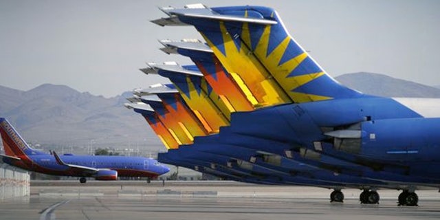 Passengers clapped as a 7-year-old boy was escorted off a plane while suffering from an allergy attack.