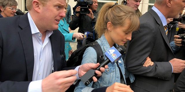 Allison Mack following her bail hearing in Brooklyn, NY.
