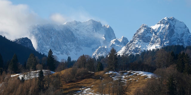 Germany's highest mountain, 9,718 feet Zugspitze (L) is pictured from the Bavarian ski resort of Garmisch-Partenkirchen, Germany, Jan. 29, 2016. (REUTERS/Dominic Ebenbichler)