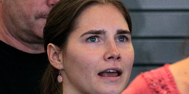This Oct. 4, 2011 file photo shows Amanda Knox speaking at a news conference shortly after her arrival at Seattle-Tacoma International Airport in Seattle. The appellate court in Italy that cleared Knox in the slaying of her British roommate has released the reasoning behind its ruling. The appellate court released its 144-page reasoning for reversing the earlier verdict on Thursday, Dec. 15, 2011.