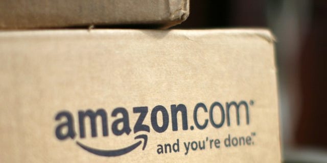 A box from Amazon.com is pictured on the porch of a house in Golden, Colorado in this July 23, 2008 file photograph.
