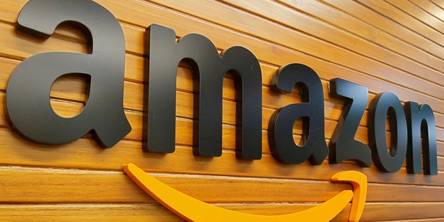 FILE PHOTO: The logo of Amazon is pictured inside the company's office in Bengaluru, India, April 20, 2018. Picture taken April 20, 2018. (REUTERS/Abhishek N. Chinnappa)