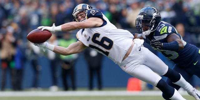 SEATTLE, WA - DECEMBER 30: Wide receiver Danny Amendola #16 of the St. Louis Rams makes a diving catch against cornerback Marcus Trufant #23 of the Seattle Seahawks at CenturyLink Field on December 30, 2012 in Seattle, Washington. (Photo by Otto Greule Jr/Getty Images)