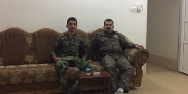 Amer with his son.